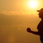 Endurance Boost - Woman With White Sunvisor Running