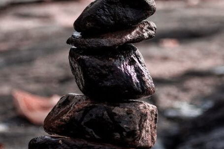 Improve Stability - Close-up on Stack of Wet Rocks