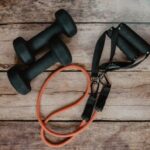 Exercise - orange and black usb cable on brown wooden surface