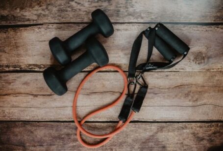 Exercise - orange and black usb cable on brown wooden surface