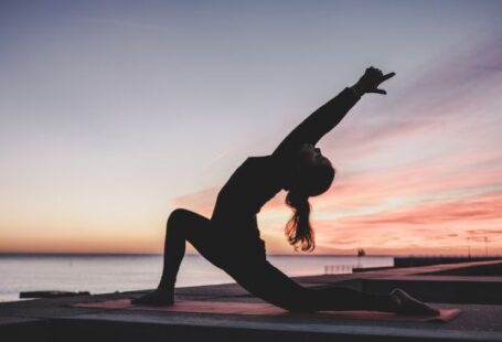 Exercise - silhouette photography of woman doing yoga