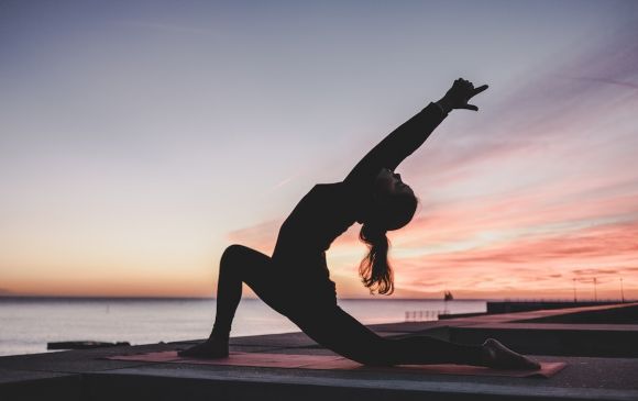 Exercise - silhouette photography of woman doing yoga